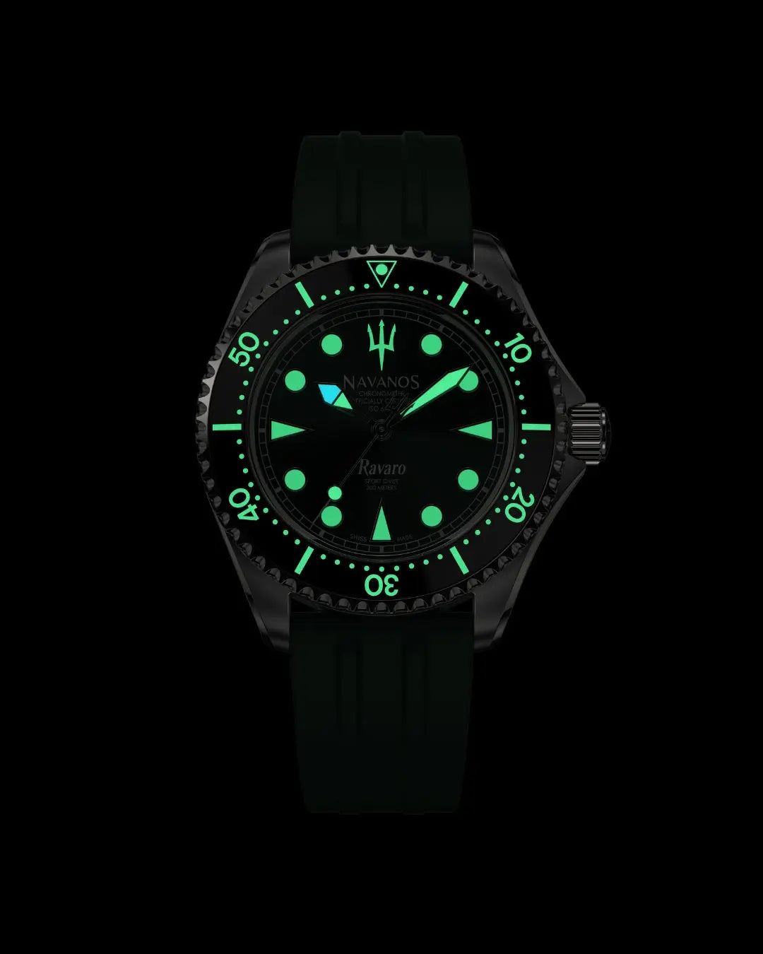 Navanos Ravaro Swiss automatic dive watch in complete darkness with powerful green Super-LumiNova lume fully illuminating the dial, markers, hands, trident logo, and bezel pip, paired with a green FKM rubber strap, 300m water resistance, COSC-certified Soprod P024 movement, studio lume shot on black background.