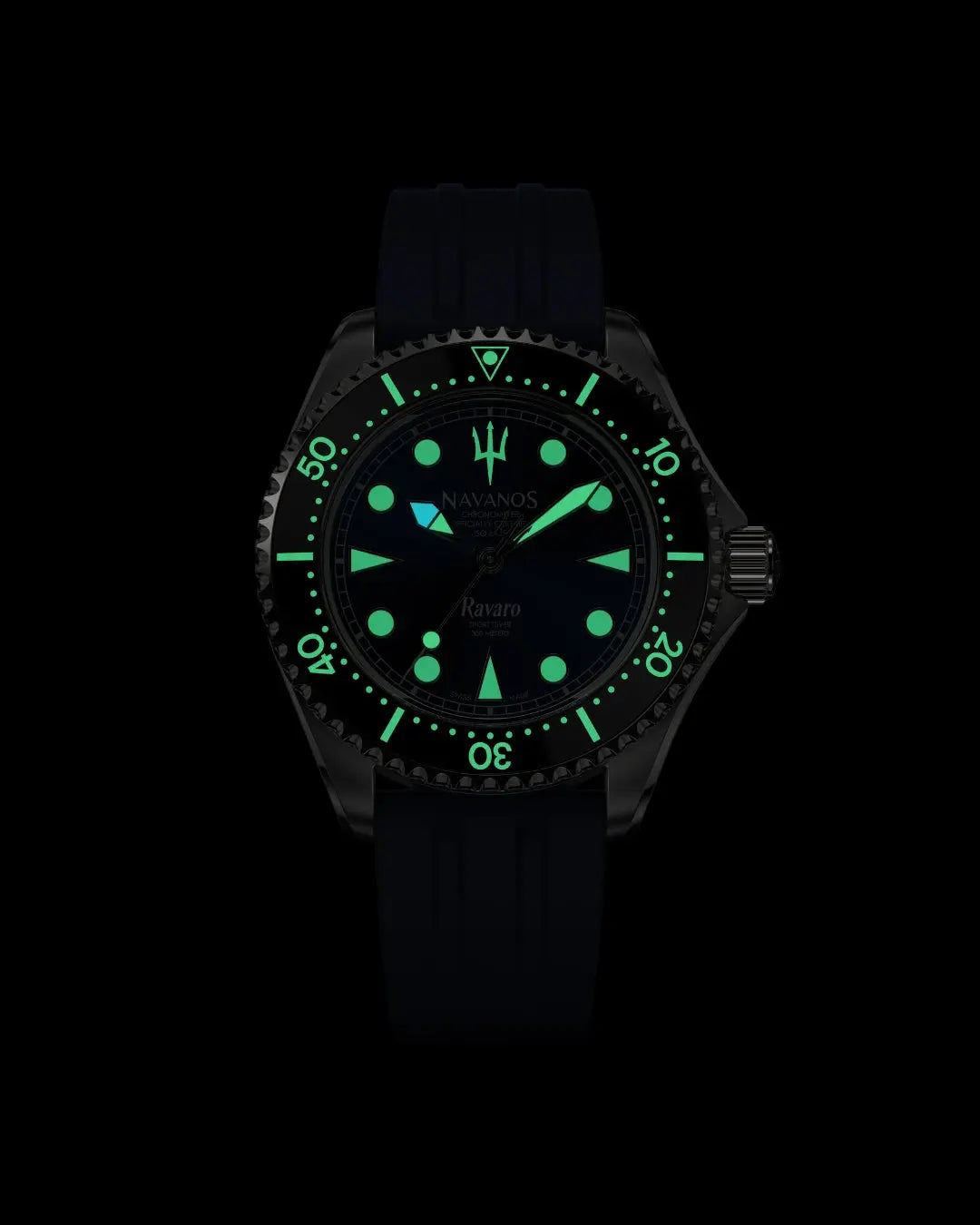 Navanos Ravaro Swiss automatic dive watch in complete darkness with strong green Super-LumiNova lume illuminating the blue sunburst dial, markers, hands, trident logo, and bezel pip, paired with navy blue FKM rubber strap, 300m water resistance, COSC-certified Soprod P024 movement, studio lume shot on black background.