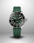 Navanos Ravaro Swiss automatic dive watch with green sunburst dial, cream luminous markers and hands, black ceramic unidirectional bezel, 300m water resistance, COSC-certified Soprod P024 movement, sapphire crystal, and matching forest green FKM rubber strap, studio shot on light gray background.