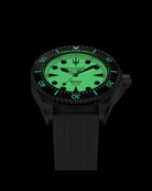Navanos Ravaro Swiss automatic dive watch in complete darkness with full Super-LumiNova luminescence glowing bright green on dial, pip, white FKM rubber strap, 300m water resistance, COSC-certified Soprod P024 movement, studio lume shot on black background.